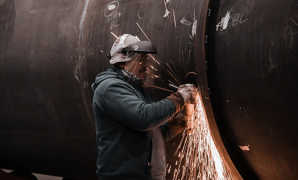 Grinder producing sparks during metalwork